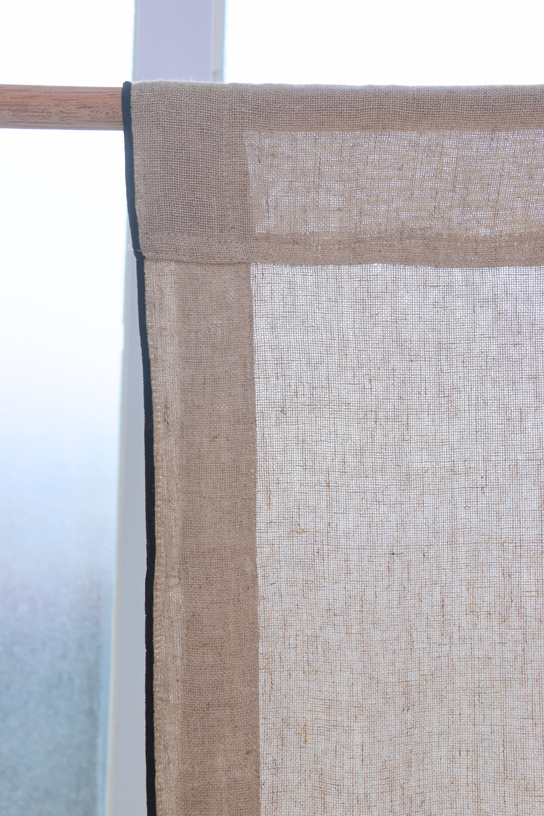 Textured fabric with a natural color palette on a white background